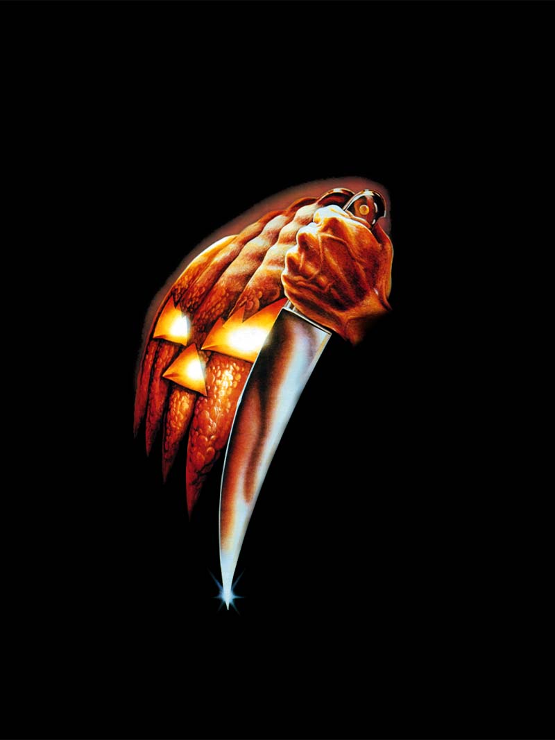 Classic Halloween Film Wallpaper with Iconic Knife and Pumpkin